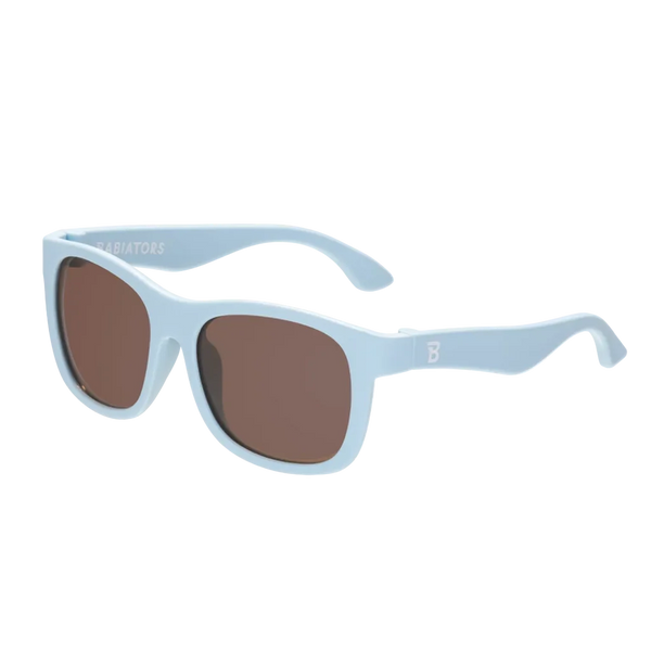 Light blue Navigators (Blue) - Babiators kid-size sunglasses with shatter-resistant dark brown lenses.