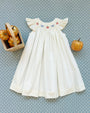 Angel Sleeve Sandy Smocked Dress - Palmetto Pearl with Pumpkin and Bow Smocking