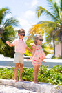 Prim & Proper Polo & Onesie - Pompano Peach with Multicolor Stork