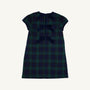 The Beaufort Bonnet Company’s Betts Bow Dress features a green and navy plaid Berwick Black Watch pattern and is accented with three Nantucket Navy velveteen bows down the back.