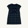 The Beaufort Bonnet Company’s Betts Bow Dress features a green and navy plaid Berwick Black Watch pattern and is accented with three Nantucket Navy velveteen bows down the back.