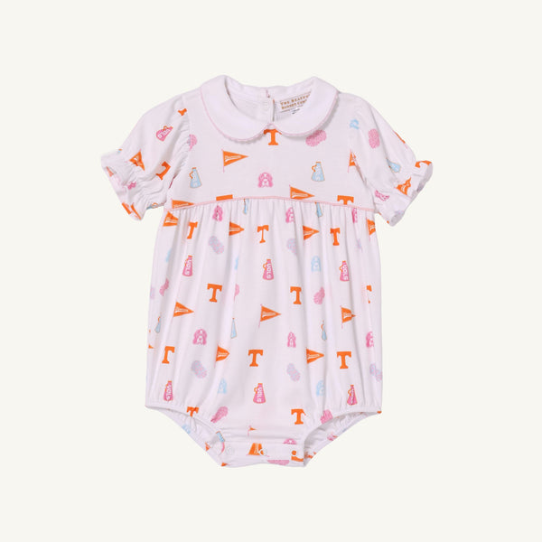 Introducing the Tennessee Britt Bubble - Victory in Orange with Palm Beach Pink by The Beaufort Bonnet Company. This white baby romper features short sleeves, a classic Peter Pan collar, and an allover print of orange, pink, and purple Tennessee-themed icons—including the letter T, pennants, and football helmets. Made from soft Pima Cotton in the signature Tennessee Britt Bubble style for ultimate comfort—perfect for celebrating Victory in Orange!.