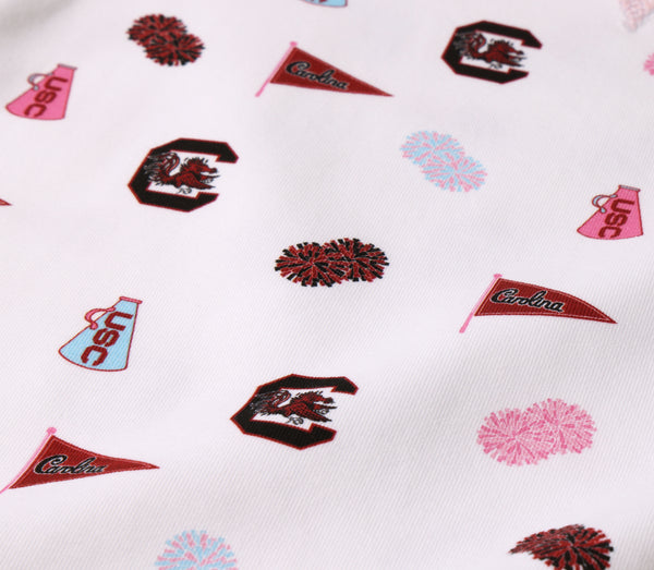 White fabric features scattered prints of USC and Carolina pennants, Gamecock logos, pink and light blue pom-poms, and megaphones reading USC—creating a fun cheerleading and sports-themed design. Perfect for showing off your South Carolina spirit or pairing with your favorite gameday look, the USC Cassidy Comfy Crewneck - South Carolina Spirit with Palm Beach Pink by The Beaufort Bonnet Company is a must-have!.