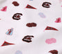 White fabric features scattered prints of USC and Carolina pennants, Gamecock logos, pink and light blue pom-poms, and megaphones reading USC—creating a fun cheerleading and sports-themed design. Perfect for showing off your South Carolina spirit or pairing with your favorite gameday look, the USC Cassidy Comfy Crewneck - South Carolina Spirit with Palm Beach Pink by The Beaufort Bonnet Company is a must-have!.