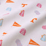 Show your school spirit with this white fabric featuring repeating orange and pink motifs—including flags reading “Tennessee,” Vols megaphones, T logos, cheerleader pom-poms, and a fun cartoon dog face. It’s the perfect match for The Beaufort Bonnet Company’s Tennessee Cassidy Comfy Crewneck – Victory in Orange with Palm Beach Pink.
