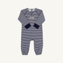 Cassidy Comfy Crewneck Romper in Nantucket Navy Stripe with long sleeves, long legs, navy cuffs, and a small colorful wagon embroidery on the chest by The Beaufort Bonnet Company, laid flat on a white background.