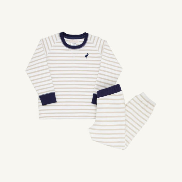The Beaufort Bonnet Company’s Cassidy & Gates Sweat Set in Keeneland Khaki Stripe & Nantucket Navy features cozy and comfortable long-sleeve pajamas for children, designed with beige and white horizontal stripes, a navy blue collar and cuffs, and a small embroidered bird on the chest. Both the top and bottom are displayed flat against a white background—ideal fall loungewear for little ones.