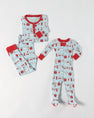 Two sets of Knox’s Night Night - Santa’s Laundry Line pajamas by The Beaufort Bonnet Company are laid flat on a white background. Made from soft Pima cotton, one set is an adult-sized two-piece with a shirt and pants featuring a whimsical winter clothes pattern and red trim, while the other is a matching one-piece designed for children or babies—perfect for coordinating family holiday pajamas.