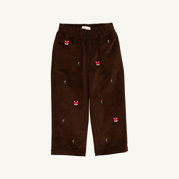 The Beaufort Bonnet Company Critter Sheffield Pants in Chelsea Chocolate Corduroy feature an elastic waistband, delightful fox embroidery, and tiny green leaves, shown on a plain white background.