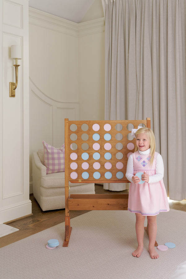 Model is wearing a size 4T.