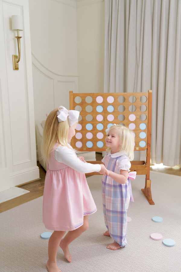 Model is wearing a size 3T.