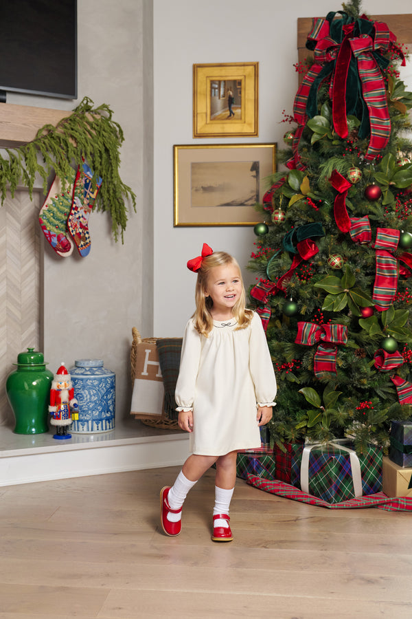 Model is wearing a size 4T.