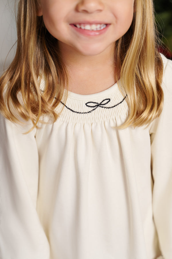 Model is wearing a size 4T.