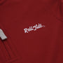 Close-up of The Beaufort Bonnet Company’s Alabama Hayword Half-Zip in Alabama Crimson with Alabama Grey and Worth Avenue White, featuring “Roll Tide” embroidered in white cursive letters—perfect for game day layering. A portion of the light gray drawstring is visible on the left side of the image.