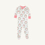 The Beaufort Bonnet Company’s Knox’s Night Night - North Pole Portrait with Richmond Red Stripe is a white baby onesie adorned with a cheerful pattern of red and green Santa Claus faces and wreaths, finished with red-and-white striped cuffs and collar, displayed on a plain background.