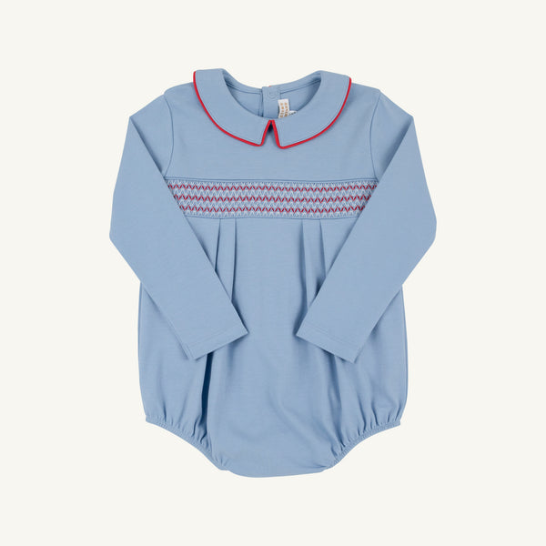 Long Sleeve Bradford Bubble - Barrington Blue with Richmond Red Smocking in pima cotton knit, featuring a Peter Pan collar with red piping and red and blue smocking across the chest.