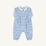 The Beaufort Bonnet Company’s Long Sleeve Bradford Romper - Blue Choo Choos with Worth Avenue White features a light blue design with a crisp white collar, charming chest buttons, and a subtle Blue Choo Choos train pattern. Expertly crafted from super-soft Pima Cotton, this romper combines comfort and timeless style.
