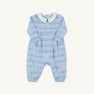 The Beaufort Bonnet Company’s Long Sleeve Bradford Romper - Blue Choo Choos with Worth Avenue White features a light blue design with a crisp white collar, charming chest buttons, and a subtle Blue Choo Choos train pattern. Expertly crafted from super-soft Pima Cotton, this romper combines comfort and timeless style.