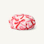 Pamper Party Shower Cap - Bonnie Scot Bows featuring a pink background with a repeating pattern of red and pink scalloped bows.