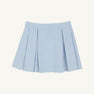 The Parson Pleated Skirt - Buckhead Blue Corduroy by The Beaufort Bonnet Company is displayed on a plain, light background. This girls’ Christmas skirt showcases a wide waistband and evenly spaced pleats in a charming light blue corduroy, offering a timeless and classic look.