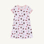 Introducing the USC Polly Play Dress – South Carolina Spirit with Palm Beach Pink by The Beaufort Bonnet Company. This short-sleeved dress is crafted from soft Pima Cotton and showcases a pink-collared design adorned with South Carolina Gamecocks logos, pennants, and mascots in maroon, pink, purple, and blue against a crisp white background for true South Carolina spirit.