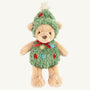 Introducing the Christmas Tree Bear - Mon Ami from The Beaufort Bonnet Company: a festive teddy bear dressed in a fuzzy green Christmas tree costume adorned with red, blue, and yellow dots, topped with a star and finished with a red bow.