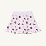 Show your South Carolina pride with The Beaufort Bonnet Company’s USC Searcy Skort - South Carolina Spirit with Worth Avenue White. This comfortable Pima Cotton skort features a white background adorned with maroon and pink university-themed icons, including pennants, foam fingers, and letter C logos, perfectly capturing true Gamecock spirit.