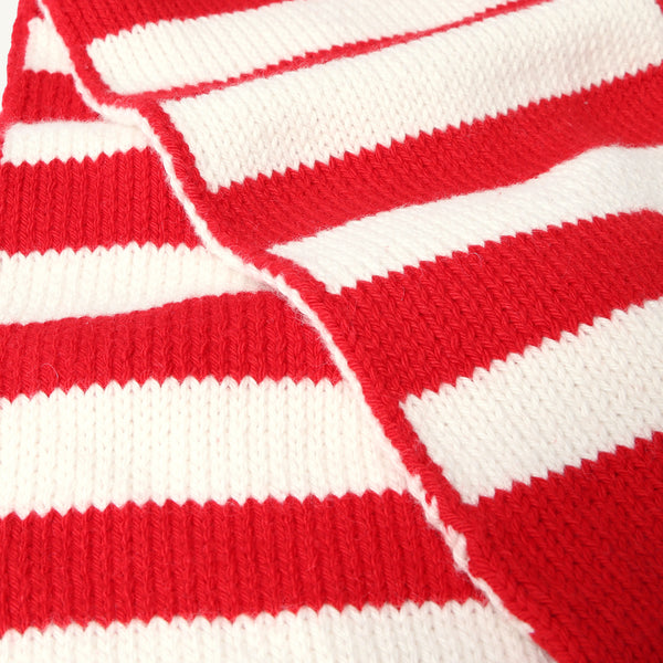 Close-up of The Beaufort Bonnet Company’s Seller’s Scarf in Richmond Red & Palmetto Pearl Stripe, showcasing its knit texture and bold red-and-white horizontal stripes. The cotton knit scarf is neatly folded, displaying a prominent seam along the center.