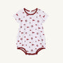The Alabama Short Sleeve Patton Play Bubble - Sweet Home Honey with Alabama Crimson by The Beaufort Bonnet Company features a white base with maroon trim and an all-over print of maroon flags, circular emblems, and small mascots. Made from 100% Pima Cotton Knit, this sweet and comfortable romper is perfect for your little one.