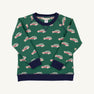 The Smitty Sweatshirt - Windsor Wagon (Grier Green) with Nantucket Navy by The Beaufort Bonnet Company is a green boys’ sweatshirt adorned with a red and white station wagon pattern, featuring navy blue collar, cuffs, and hem, plus a cozy fleece interior. The sweatshirt is shown laid flat on a white background.