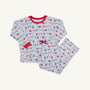 The Snooze Button Set - Santa’s Laundry Line by The Beaufort Bonnet Company is a festive children’s pajama set featuring a white background with red trim and a whimsical print of red and blue winter clothing hanging on clotheslines. This Christmas set includes a cozy long-sleeve top and matching pants, perfect for comfortable holiday lounging.