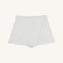 Stella Skort - Quilted Palmetto Pearl by The Beaufort Bonnet Company: A white quilted skort featuring a wrap-style front and a subtle diamond pattern, perfect as girls’ skirt shorts, shown against a plain white background.