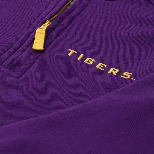 A close-up of The Beaufort Bonnet Company’s LSU Hayword Half-Zip in LSU Purple with LSU Gold, featuring a yellow zipper and TIGERS embroidered in yellow letters on the chest—perfect for game day wear.