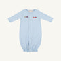 Introducing the Twinkle Twinkle 2-in-1—Buckhead Blue with Trains by The Beaufort Bonnet Company. Crafted from soft Pima cotton, this charming layette features a light blue hue, long sleeves, front snap buttons, and an elasticized bottom for easy changing. A delicate embroidered train motif spans the chest, adding a touch of classic charm. Perfect for your little one—all set against a plain white background.