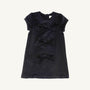 A short-sleeved, dark navy Betts Bow Dress - Newport Night Velveteen featuring three horizontal velvet bows down the center front.