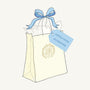 A cream-colored Happy Mystery Mail - Boys Accessories Pack of 5 gift bag tied with a blue ribbon and a tag for Little Gents boys accessories.