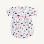 The Beaufort Bonnet Company’s Florida Britt Bubble - Florida Forever with Hamptons Hot Pink is a white baby romper crafted from soft Pima Cotton Knit in their signature bubble style, featuring puff sleeves and a Peter Pan collar. The cheerful Florida Forever print showcases colorful footballs, pom-poms, cheer skirts, megaphones, and flags—perfect for celebrating the University of Florida.