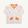 The Beaufort Bonnet Company’s Tennessee Cassidy Comfy Crewneck - Victory in Orange with Tennessee Orange is a white long-sleeve kids’ shirt accented with orange cuffs, collar, and hem. It showcases an all-over University of Tennessee themed print featuring orange T logos, pennants, “VOLS” text, and blue Smokey dog icons—making it a playful and spirited crewneck for young Vols fans.
