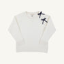 The Beaufort Bonnet Company’s Cassidy Comfy Crewneck – Quilted Palmetto Pearl with Nantucket Navy Bows – is a white quilted sweatshirt with long sleeves, ribbed cuffs and hem, and two small navy bows on the left shoulder, offering both style and comfort.