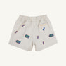 The Beaufort Bonnet Company’s Florida Critter Sheffield Shorts in Saratoga Stone feature a light-colored design with an elastic waistband, decorated with repeating University of Florida Gators logos and blue “F” letters. A small back pocket displays an emu patch and text, making these the perfect kids’ gameday shorts for flaunting your Florida spirit.