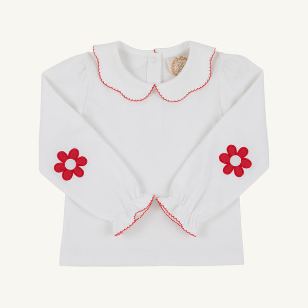 Emma’s Elbow Patch Top - Worth Avenue White with Richmond Red Flowers: a white Pima cotton long-sleeved top with a Peter Pan collar, red flower elbow patches, and red scalloped trim.