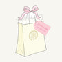 A Happy Mystery Mail - Girls Burp Cloths & Bibs Pack of 5 gift bag tied with a pink ribbon and a tag labeled LITTLE LADIES burp cloths & bibs.