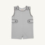 Jack Keene Jon Jon - Grantley Gray Houndstooth with Grantley Gray romper featuring gray and white houndstooth, buttoned shoulders and sides, and dark gray piping trim, perfect for a winter family portrait.