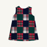 The Beaufort Bonnet Company Juliet Jumper - Mercer Island Madras is a sleeveless A-line jumper featuring a checkerboard pattern of solid dark green and red-and-white plaid squares.