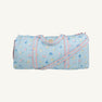 Introducing the Logan’s Long Weekend Bag by The Beaufort Bonnet Company, featuring the Little London Flowers print with charming pink gingham accents—a delightful light blue quilted carryall designed with practical handles and an adjustable shoulder strap, making it the perfect travel essential.