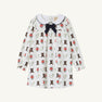 The Beaufort Bonnet Company’s Long Sleeve Banks Bow Dress - Happy Hunting with Palmetto Pearl & Nantucket Navy is crafted from soft Pima Cotton Knit. This long-sleeve white dress features a Nantucket Navy bow and an adorable print of cowboy boots, horseshoes, and red flowers. Finished with a Peter Pan collar detailed in dark trim, it’s the perfect fall dress for your little one.