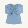 The Beaufort Bonnet Company Long Sleeve Sandy Smocked Dress in Barrington Blue with Richmond Red Holly features a smocked yoke with red and green embroidery, perfect for holiday parties.