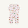 The Beaufort Bonnet Company Paxton Playsuit - Christmastime Cuties (Belwood Blush) with Palmetto Pearl features a baby onesie decorated with colorful cartoon animals and presents, long sleeves, white cuffs, and a front zipper, displayed flat on a plain white background.
