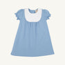 A Pharish Frock in Barrington Blue with Worth Avenue White by The Beaufort Bonnet Company, featuring short sleeves, a white scalloped collar, and gathered fabric below the chest, is displayed on a plain white background.