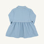 A children’s long-sleeve Pippa Peacoat from The Beaufort Bonnet Company, shown from the back in Barrington Blue with Palmetto Pearl accents. Reminiscent of the classic Barrington Blue coat, it features a gathered waist, white piping detail, and a collar. The peacoat is displayed against a plain white background.